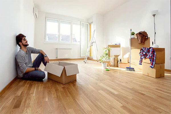 Happy families and individuals celebrating moving into affordable housing in the United States. (cheap housing)