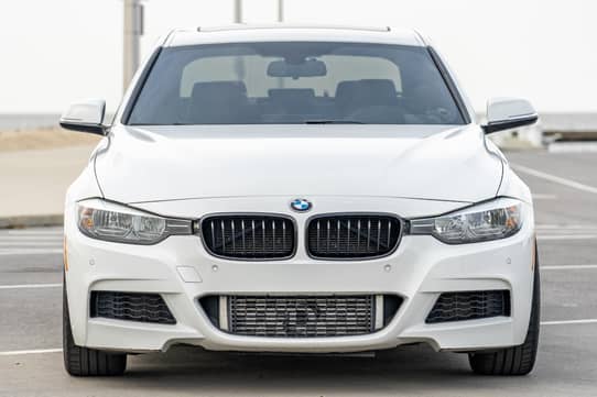 BMW F30 328i sedan exterior front view parked outdoors