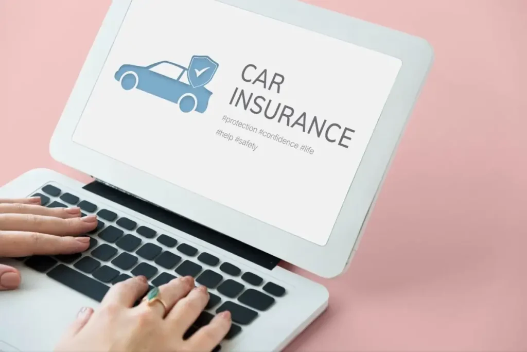 BMW car insurance quote displayed on laptop screen