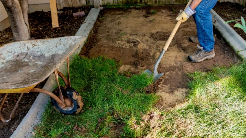 Backyard grass removal compared to gravel yard replacement.