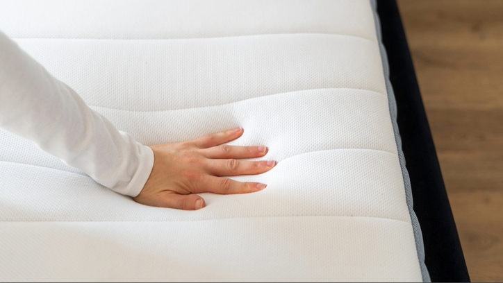 Body impression visible on foam mattress