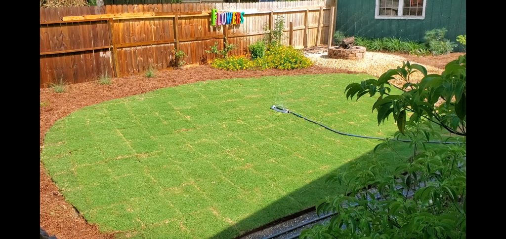 Comparison of sod installation, gravel backyard, paver patio, and artificial turf installation.