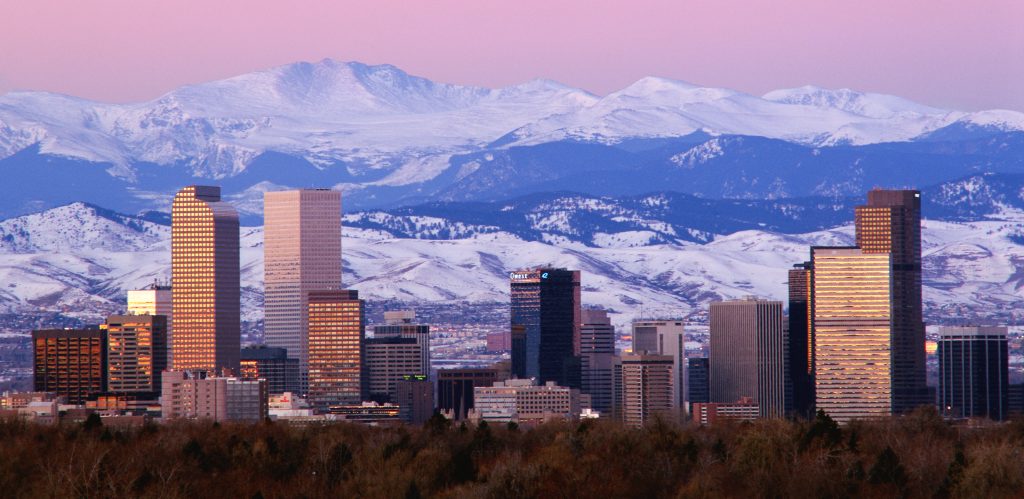 Denver skyline with Rocky Mountains backdrop