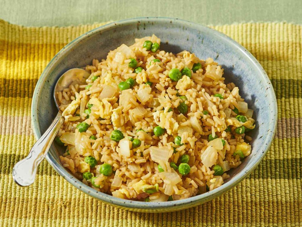 Easy egg fried rice cooked in a skillet for two people