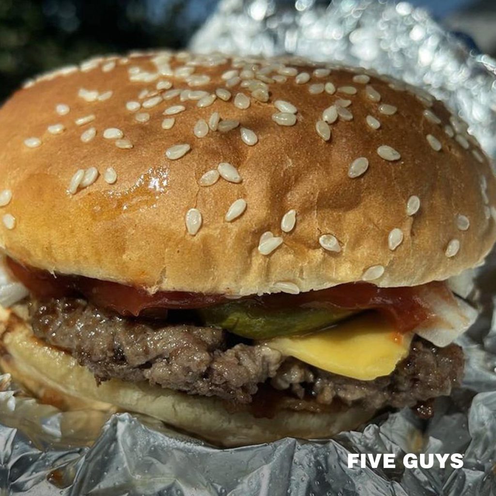 Five Guys little cheeseburger with multiple toppings