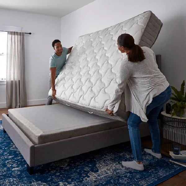 Rotating mattress on bed frame
