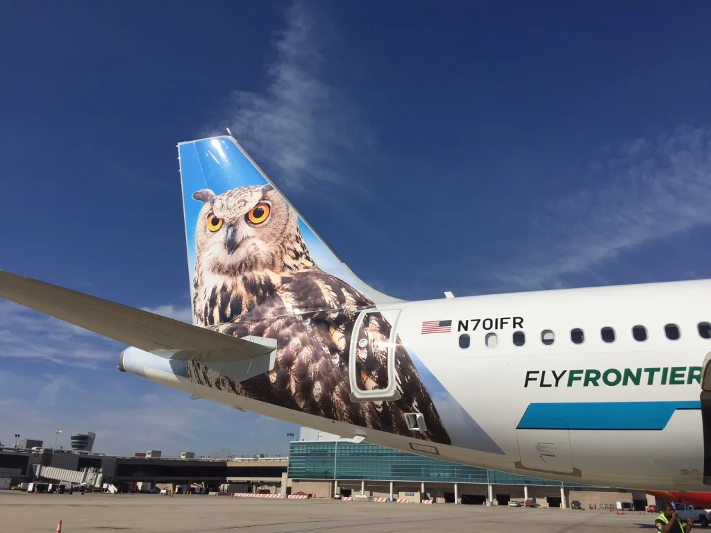Frontier Airlines airplane with animal tail design