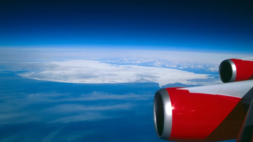 Plane flying over Atlantic Ocean