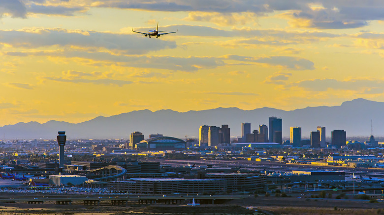 Runway at Phoenix airport with desert mountains in background