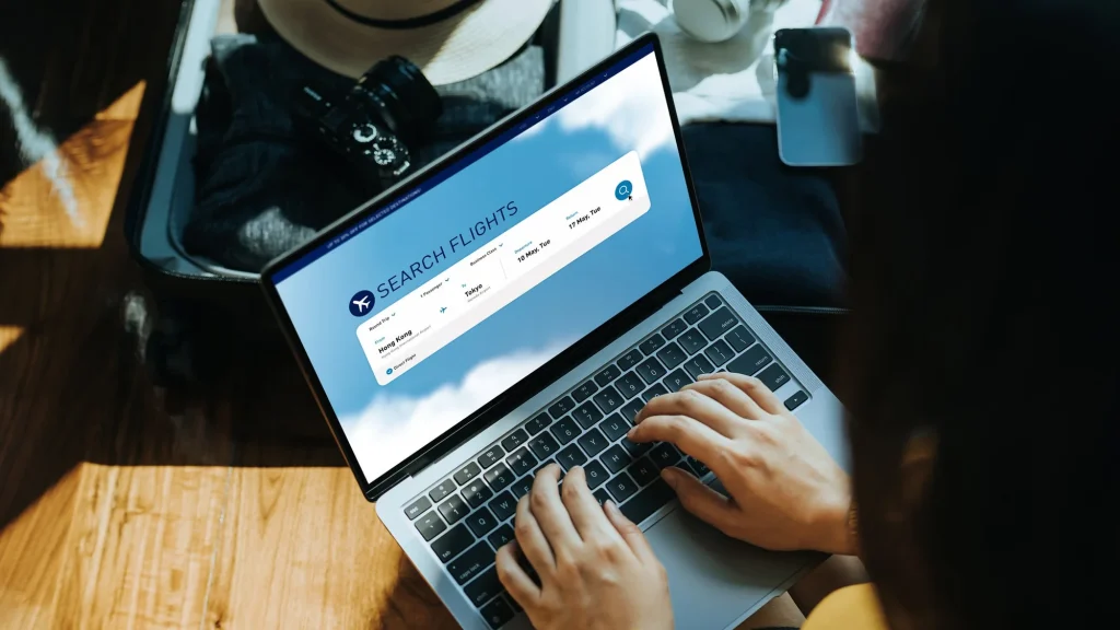 Searching cheap flights on laptop