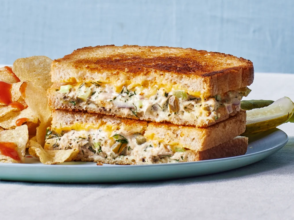 Tuna melt sandwiches served with fresh side salad for two