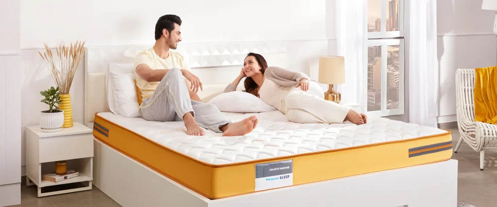 Couple sleeping comfortably on budget mattress