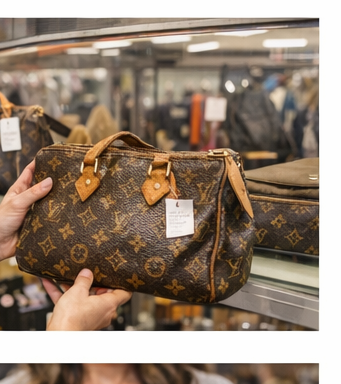 buyer inspecting used louis vuitton handbag