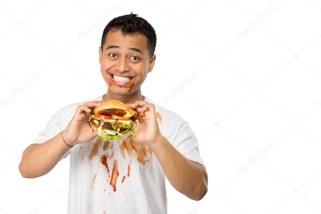 Happy person eating affordable cheeseburger. (cheap burgers near me)