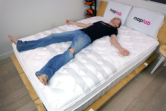 Back sleeper maintaining spinal alignment on mattress