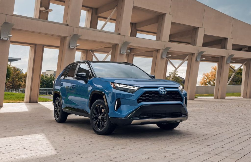 Used Toyota RAV4 Hybrid compact SUV parked for sale