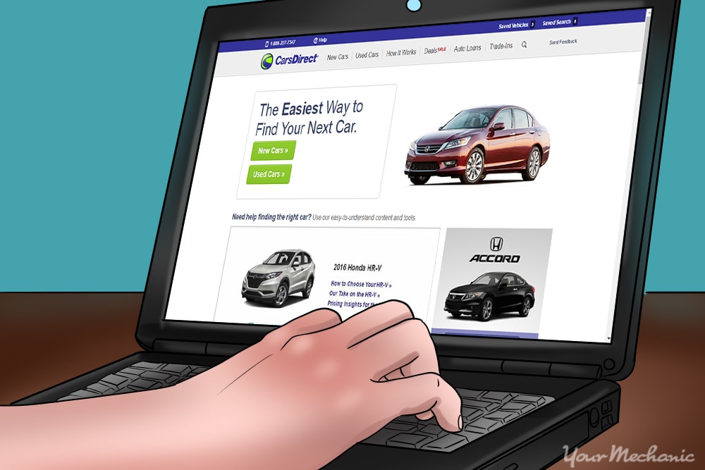 Buyer searching for cheap manual cars at a used car dealership in the United States.