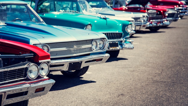 Affordable muscle cars parked on street
