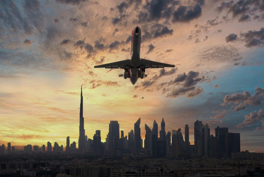 Airplane taking off at sunset representing cheap flights from Memphis