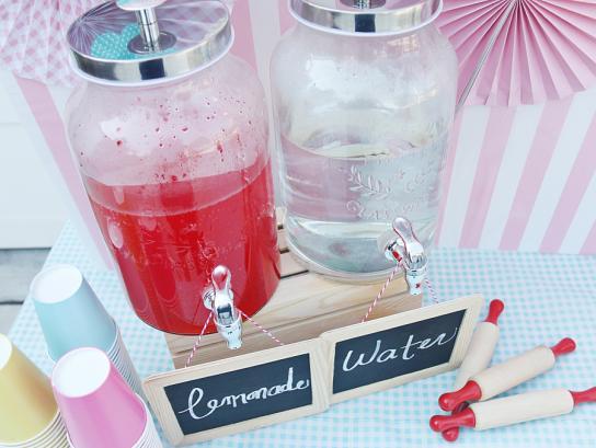 Baby shower drink station with lemonade and punch