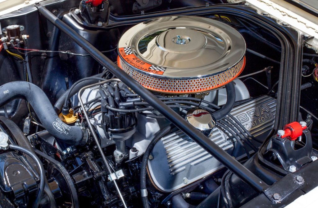 “Close-up view of a powerful V8 engine inside an American muscle car”
