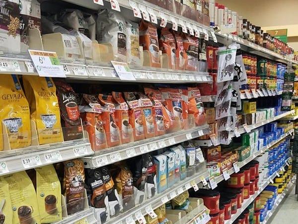 Coffee aisle in Walmart USA with multiple brands