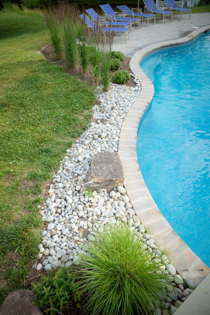 DIY rock garden landscaping around above ground pool