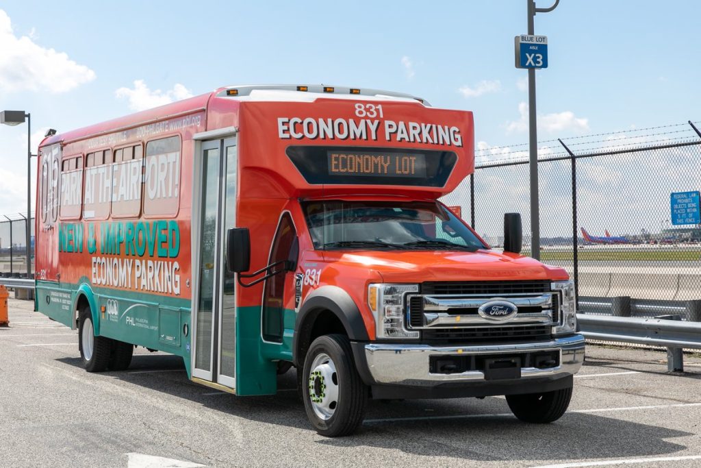 Economy airport parking lot with shuttle service