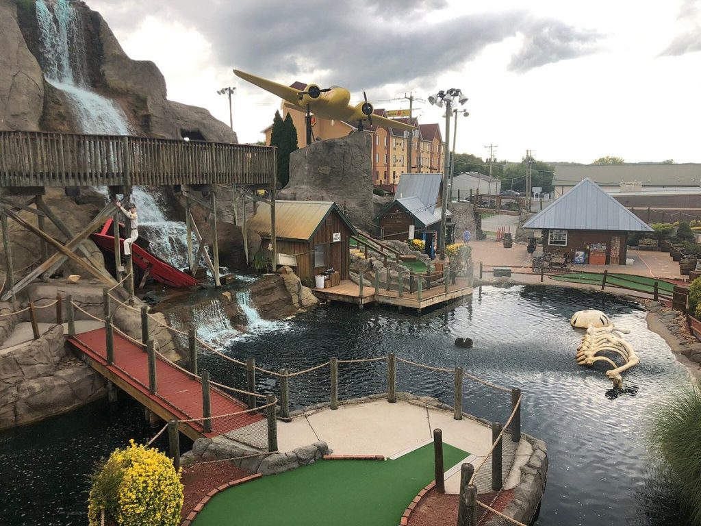 Families enjoying a fun mini golf course in Pigeon Forge Tennessee