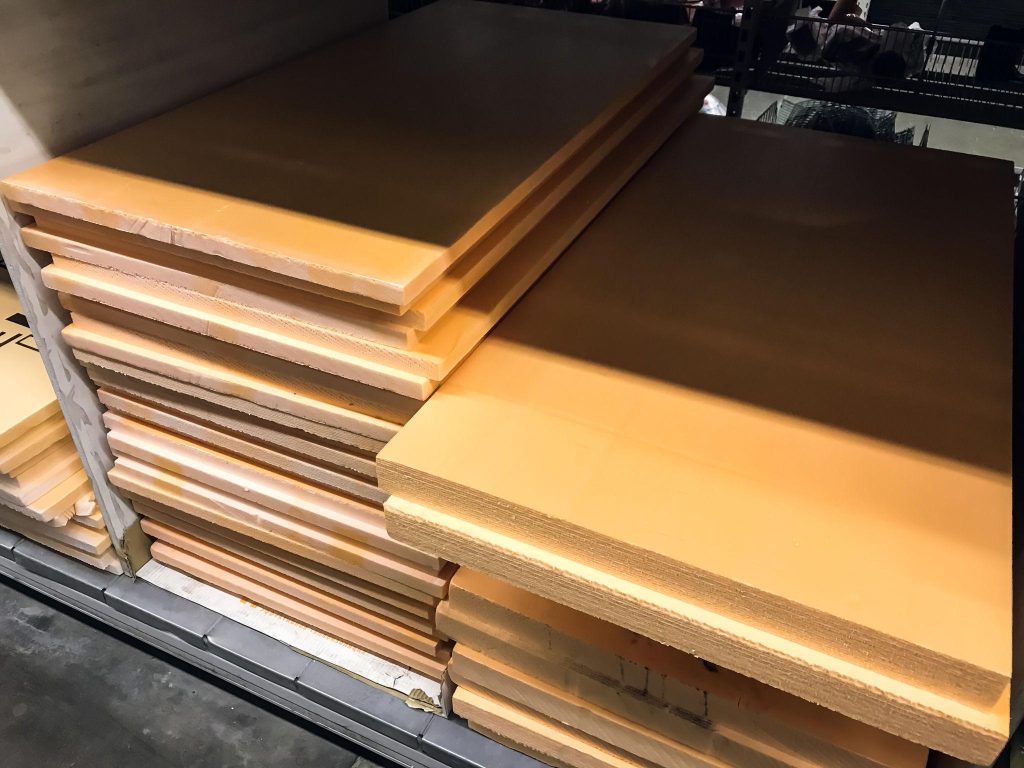 Home Depot insulation aisle with fiberglass and foam options