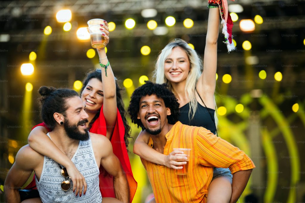 People enjoying cheap activities near them such as markets museums concerts and casual games