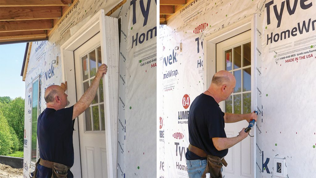 Pre-hung exterior double doors with frame being installed during home renovation