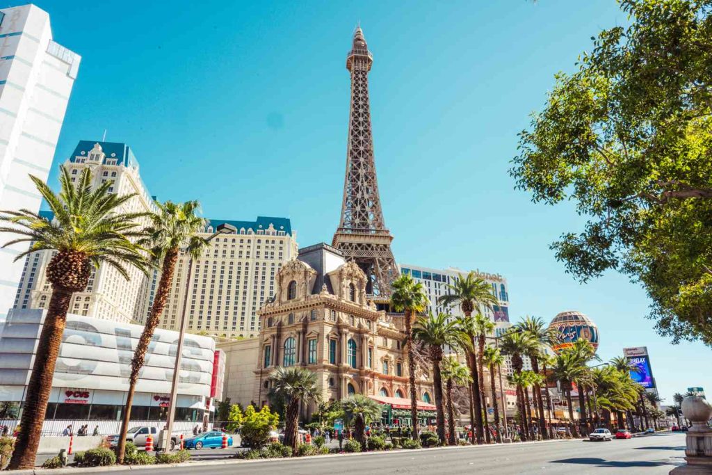 Tourist planning affordable Las Vegas trip using a phone