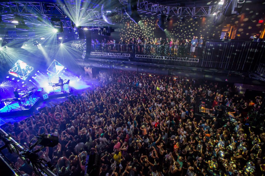 Tourists enjoying free live music in a Las Vegas bar or lounge