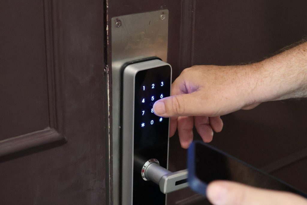Traveler checking hotel room safety including locks lighting and surroundings