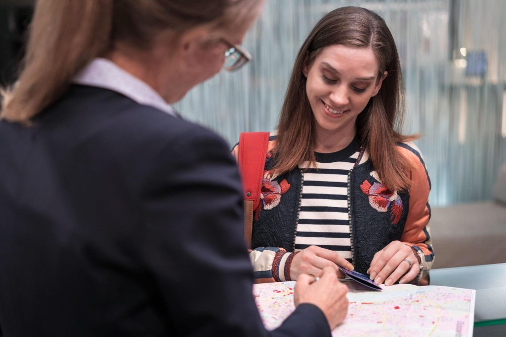 Traveler satisfied after finding a cheap hotel under $50 and enjoying the stay