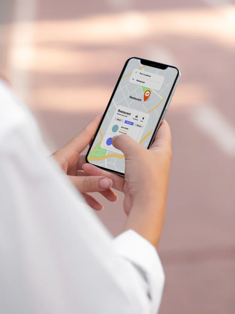 Travelers researching cheap things to do in Pigeon Forge using phones and travel guides