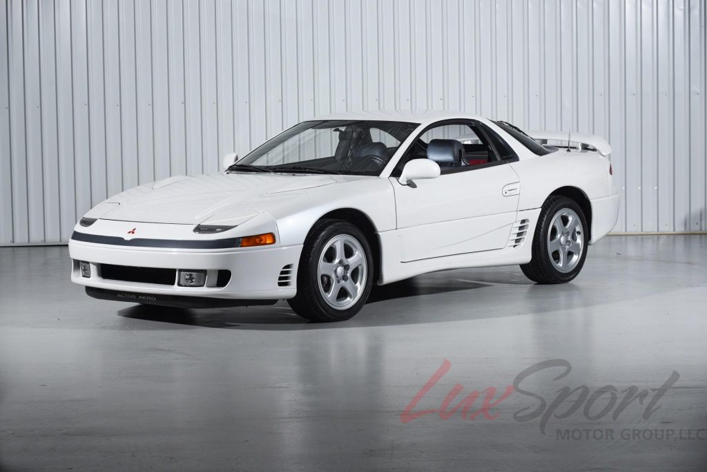 White Mitsubishi 3000GT VR4 in studio.