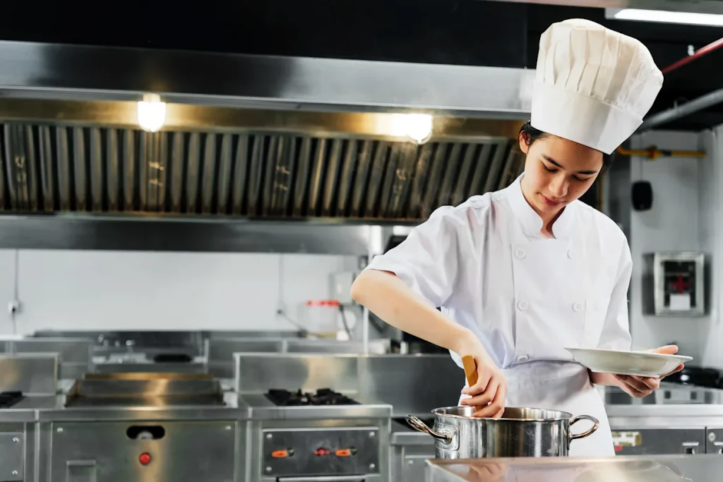 chef preparing affordable steak in kitchen