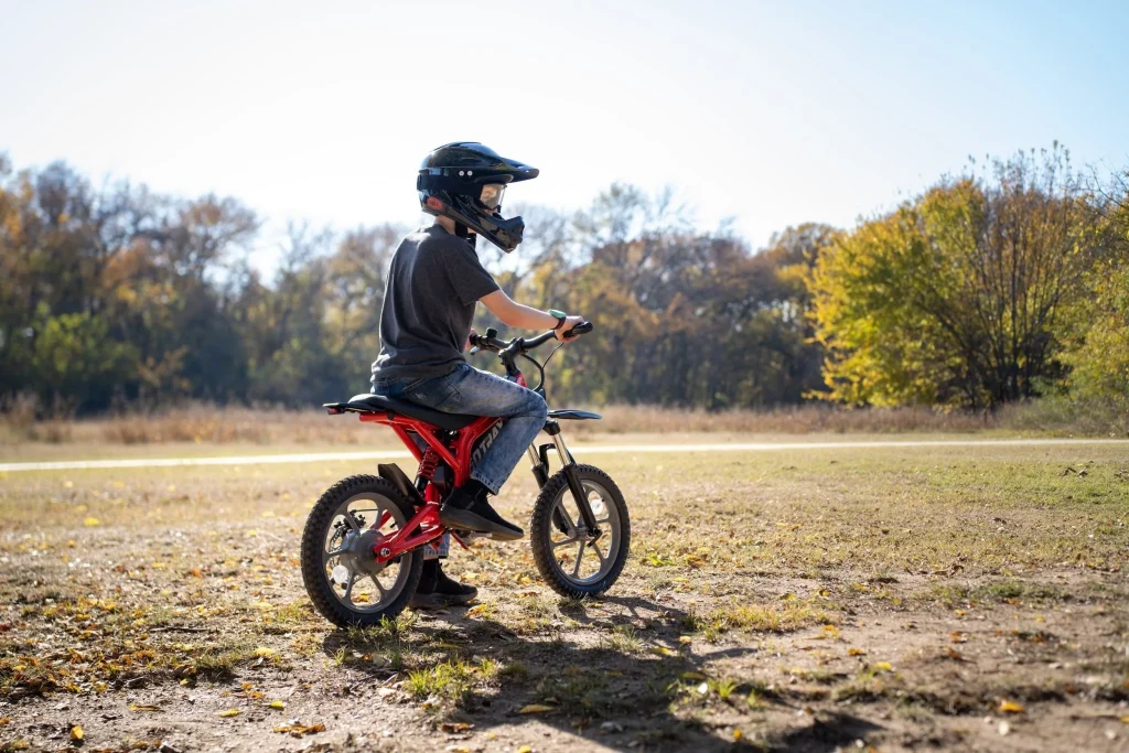 family riding affordable electric dirt bikes outdoors