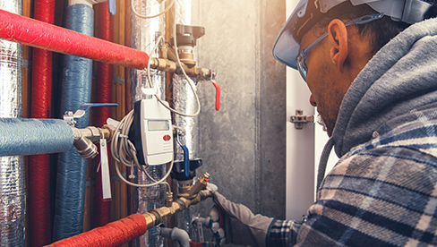 homeowner reading water heater FAQ online