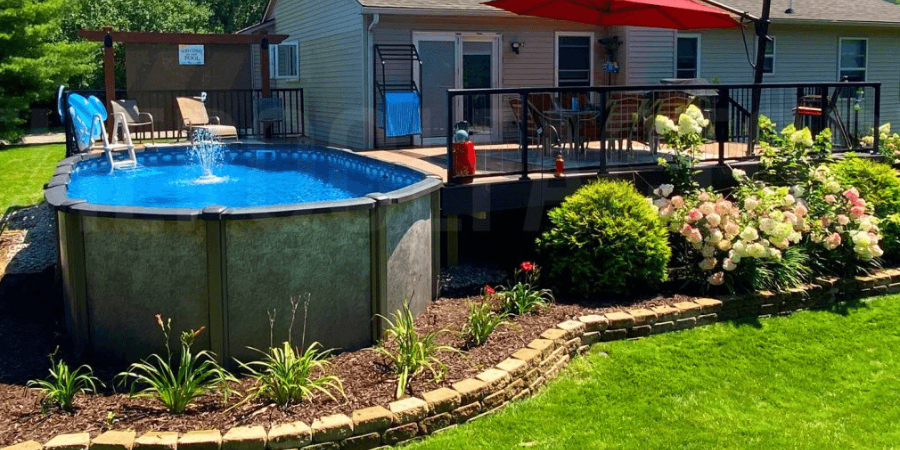 mulch landscaping around above ground pool with plants