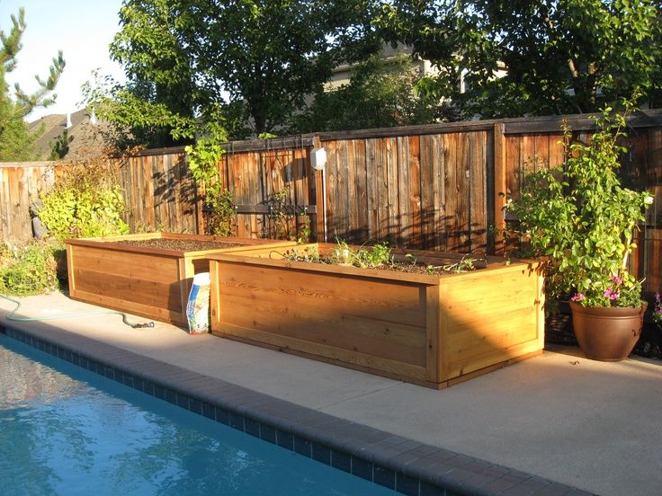 raised garden beds around above ground pool landscaping